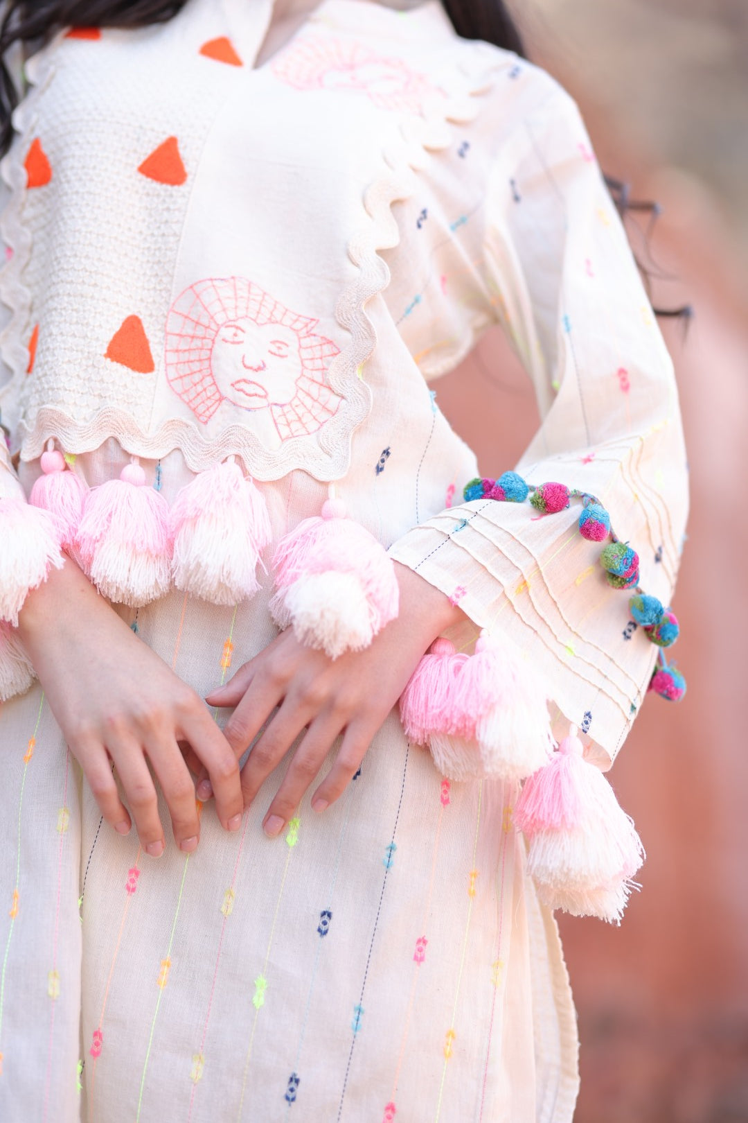 A closer look at happiness—stitched in tassels, pom-poms & patches 💖