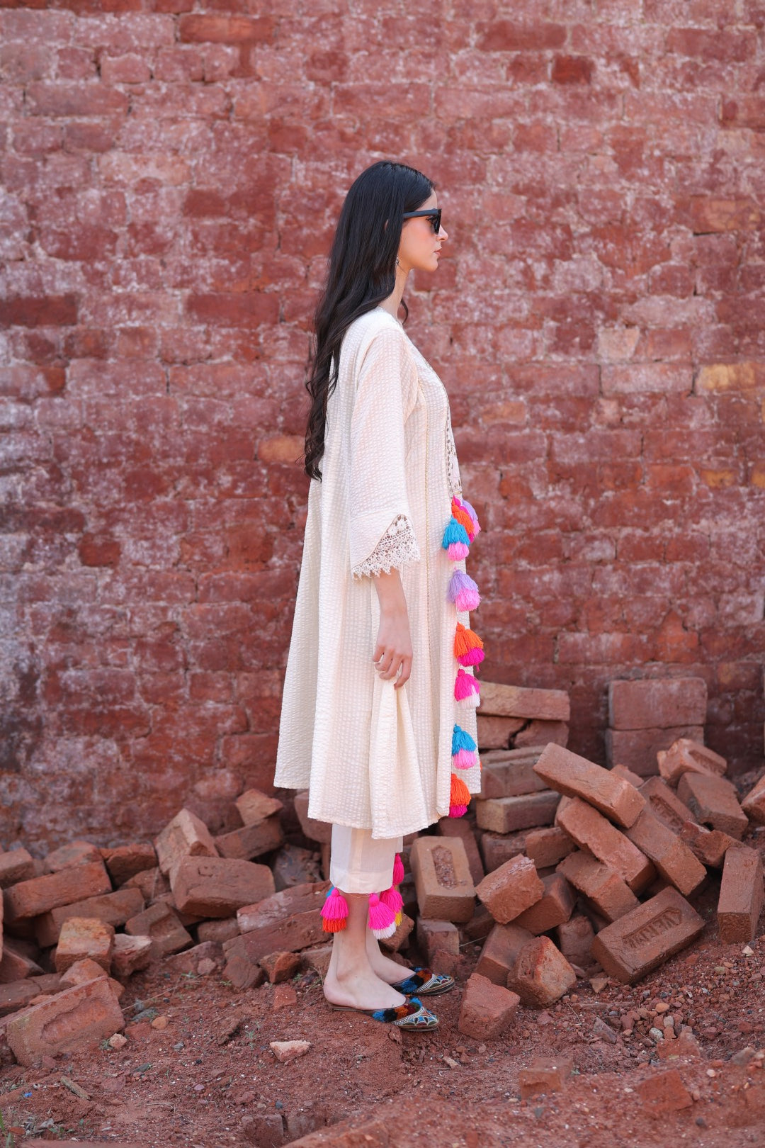Model side profile with accessories and outfit silhouette