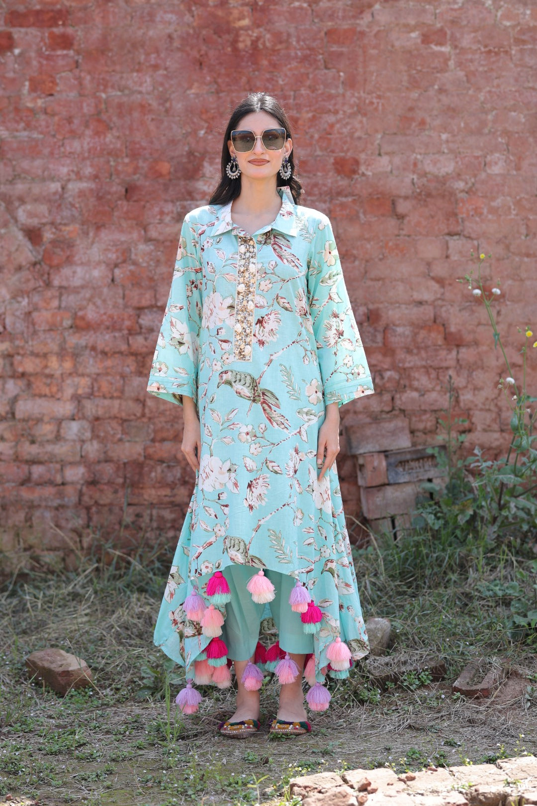 Front view of aqua kurta set with sequin placket and bird print