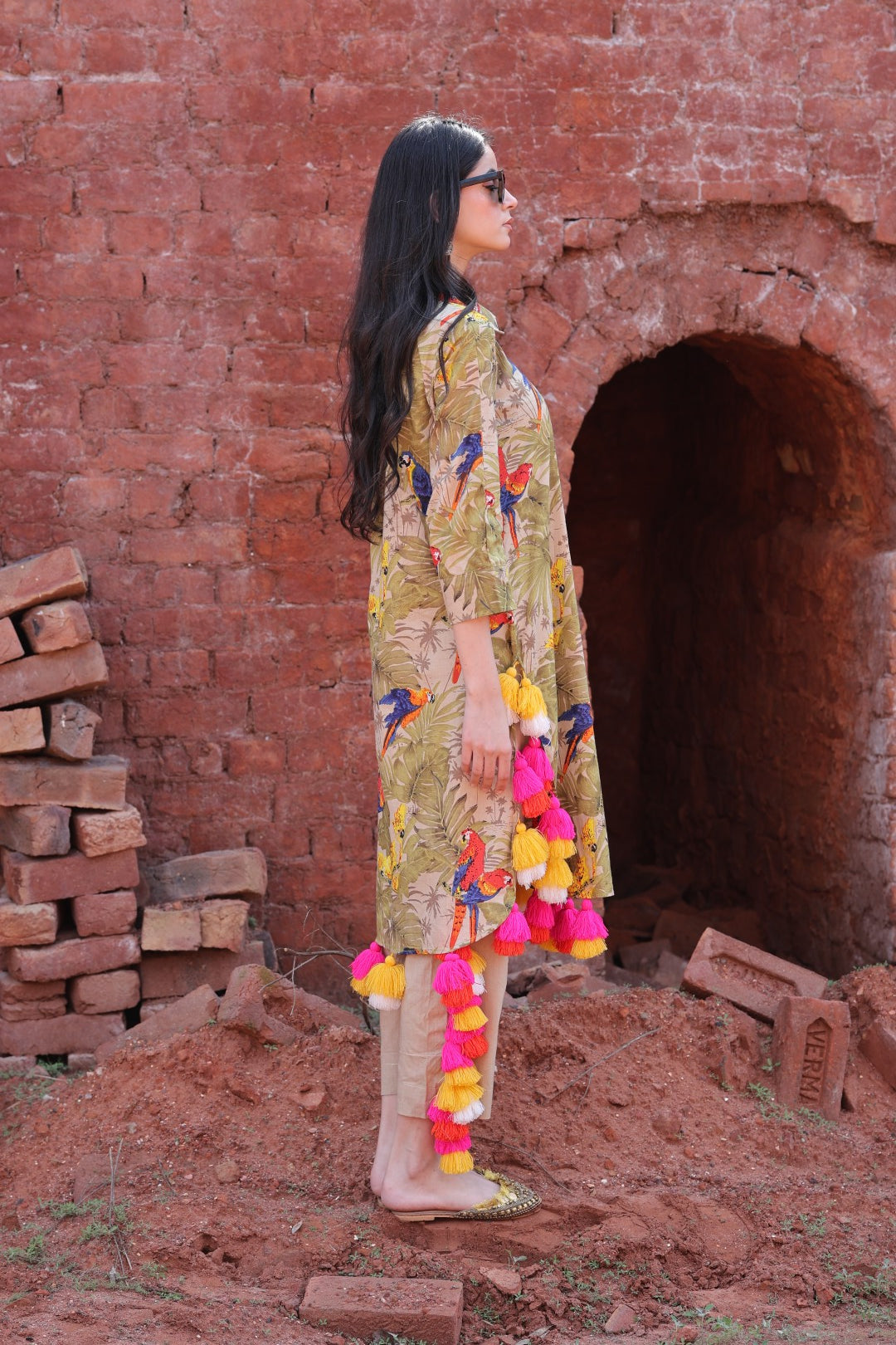 Side view with visible mirror-work placket and print detail