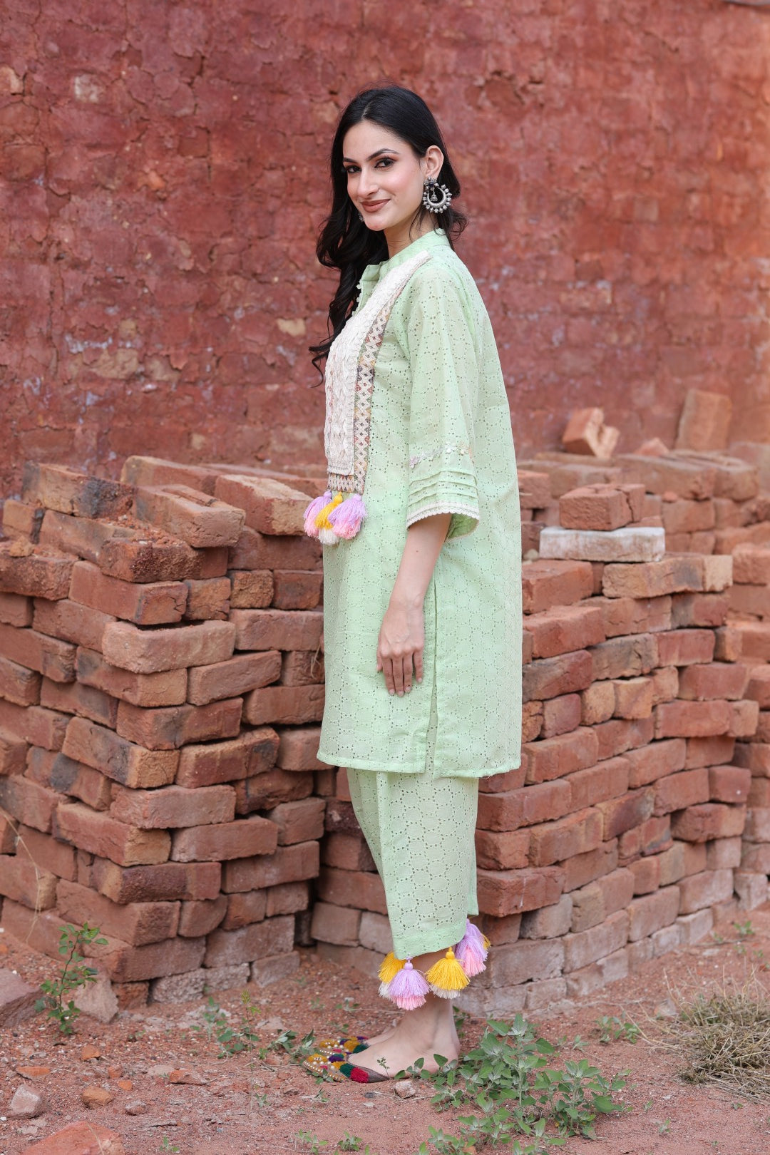 Left side of the kurta highlighting sleeve lace detail and silhouette